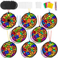 Craft kit with multiple colorful mandala flower suncatchers, black frames, and assorted craft supplies including paper, strings, and suction cups.
