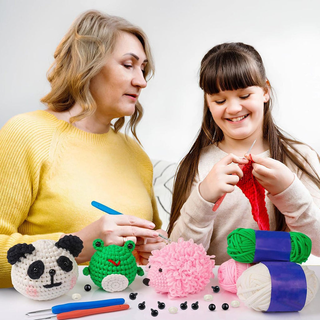 Woman and child crochet crafting with yarn and safety eyes