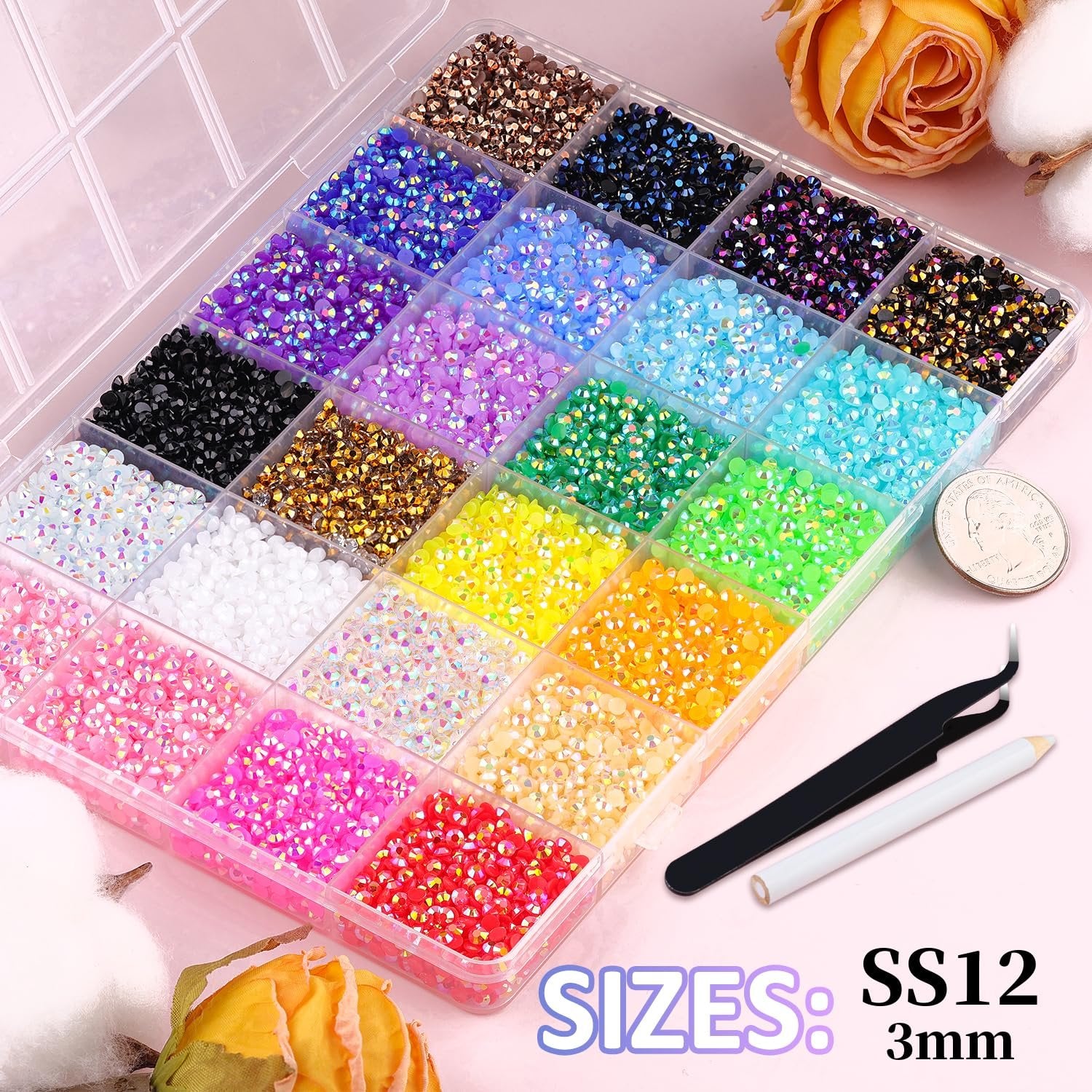 Flatback rhinestones in a 24-grid organizer box with tweezers and pickup pen, showing various colors.