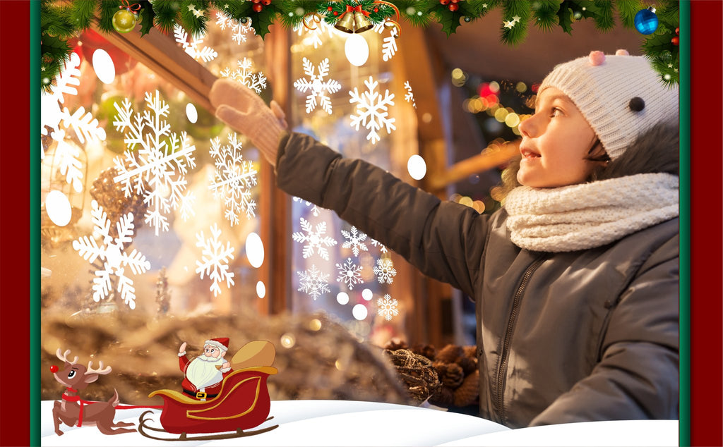 Child in winter clothing reaching towards snowflake decals on a window with Santa and reindeer graphic below