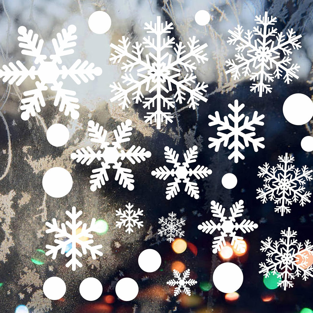 White snowflake and circle window decals on a frosted window with bokeh lights