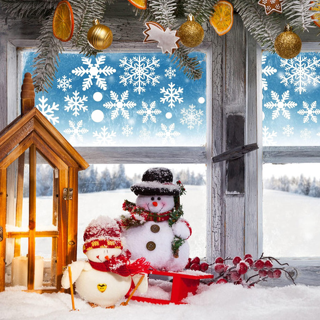 Christmas window scene with snowmen, festive decorations, and snowflakes on the glass