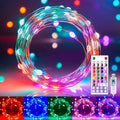 Color changing fairy lights coiled with a remote control and USB connector, showing multiple colors and modes.
