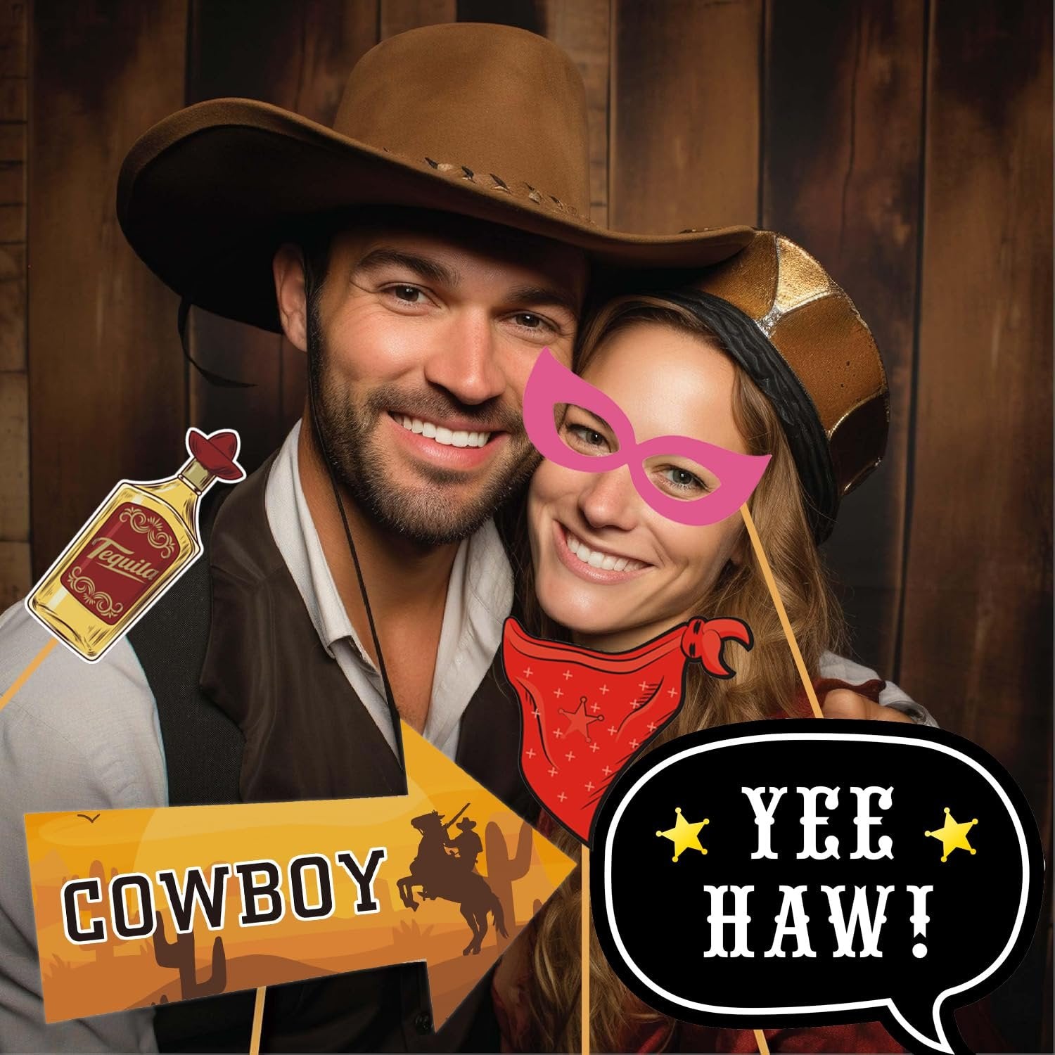 Couple posing with western-themed photo booth props including a cowboy hat, mask, bandana, and speech bubble.