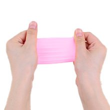 Two hands stretching a pink silicone band against a white background