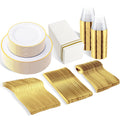 White and gold disposable dinnerware set including plates, cups, napkins, and cutlery arranged on a white background.