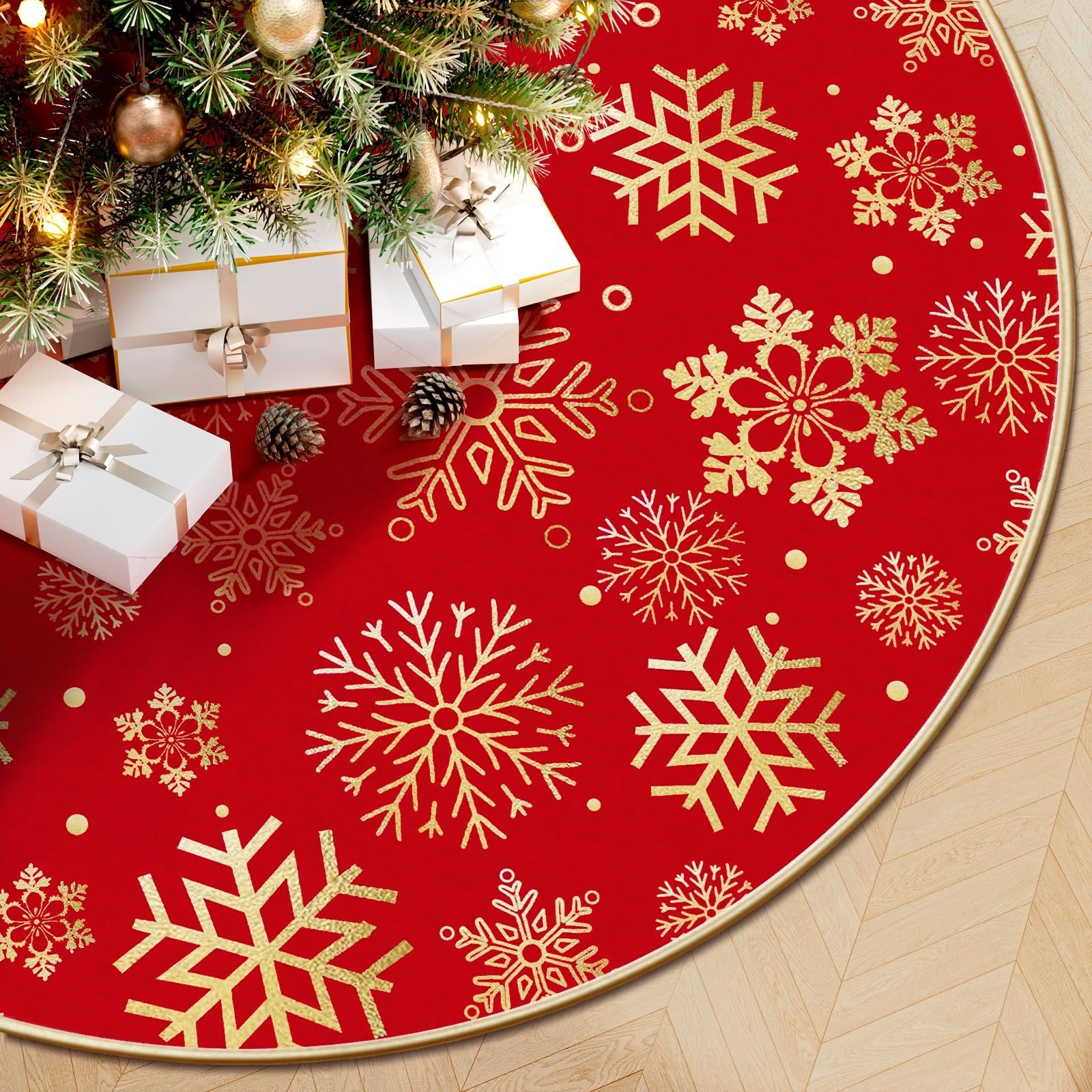 Red Christmas tree skirt with gold snowflake print, shown under a decorated tree with gifts and pinecones.