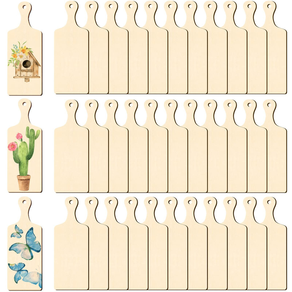 Unfinished wood mini cutting boards with handles, three with decorative designs: birdhouse, cactus, and butterflies.