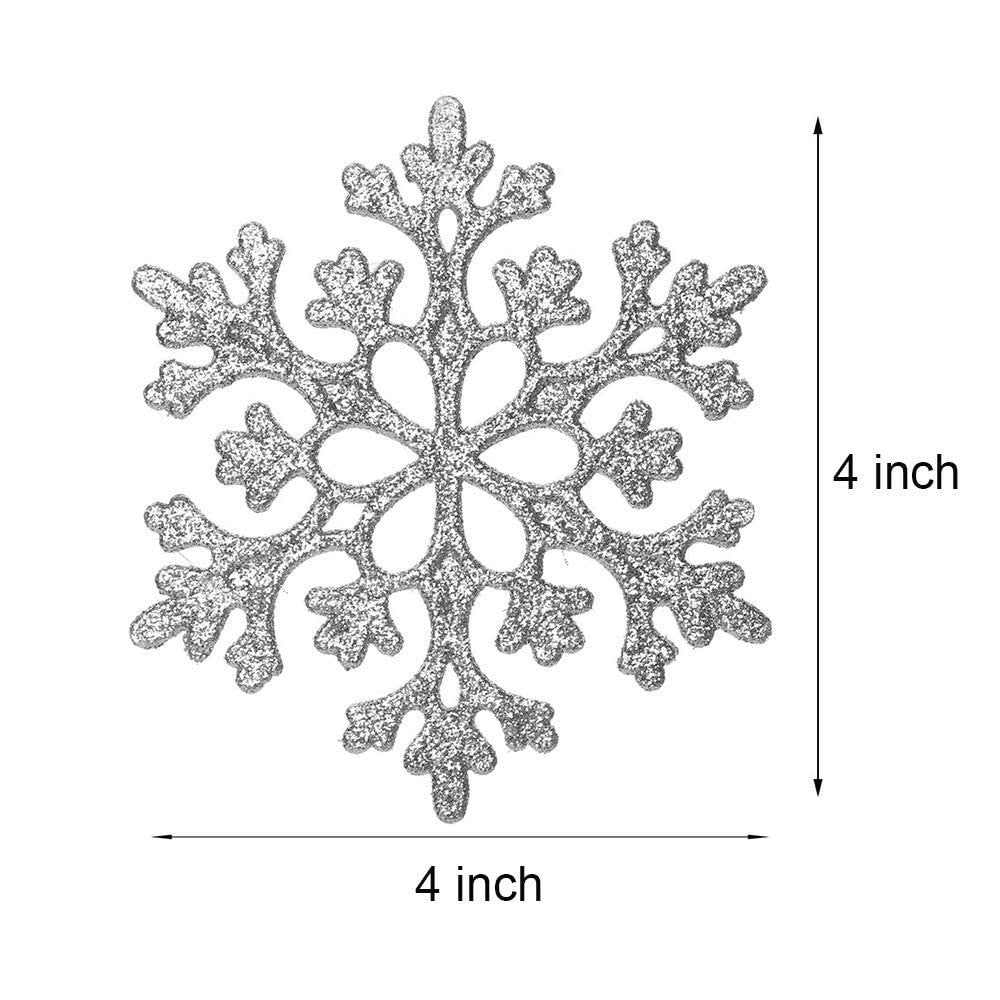 Silver glitter snowflake ornament shown with dimensions indicated as 4 inches by 4 inches.
