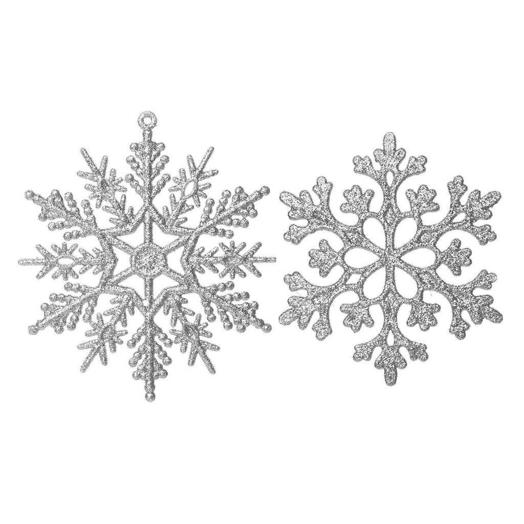 Two silver glitter snowflake ornaments on a white background, showing two different styles.