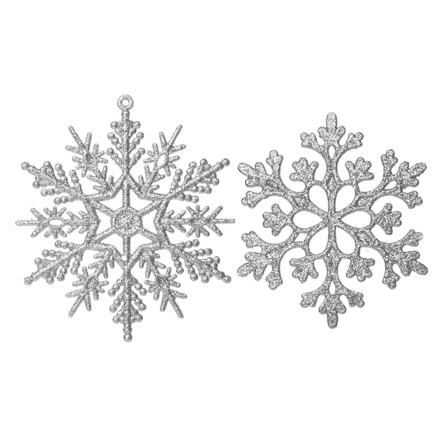 Two silver glitter snowflake ornaments on a white background, showing two different styles.