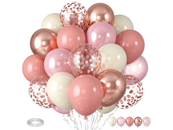 A large bouquet of assorted latex balloons in shades of pink, cream, and metallic rose gold, some filled with confetti.