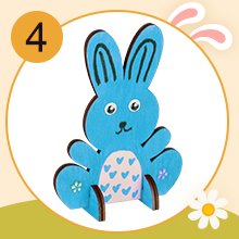 Blue wooden bunny craft cutout with pink heart details, shown assembled and standing.