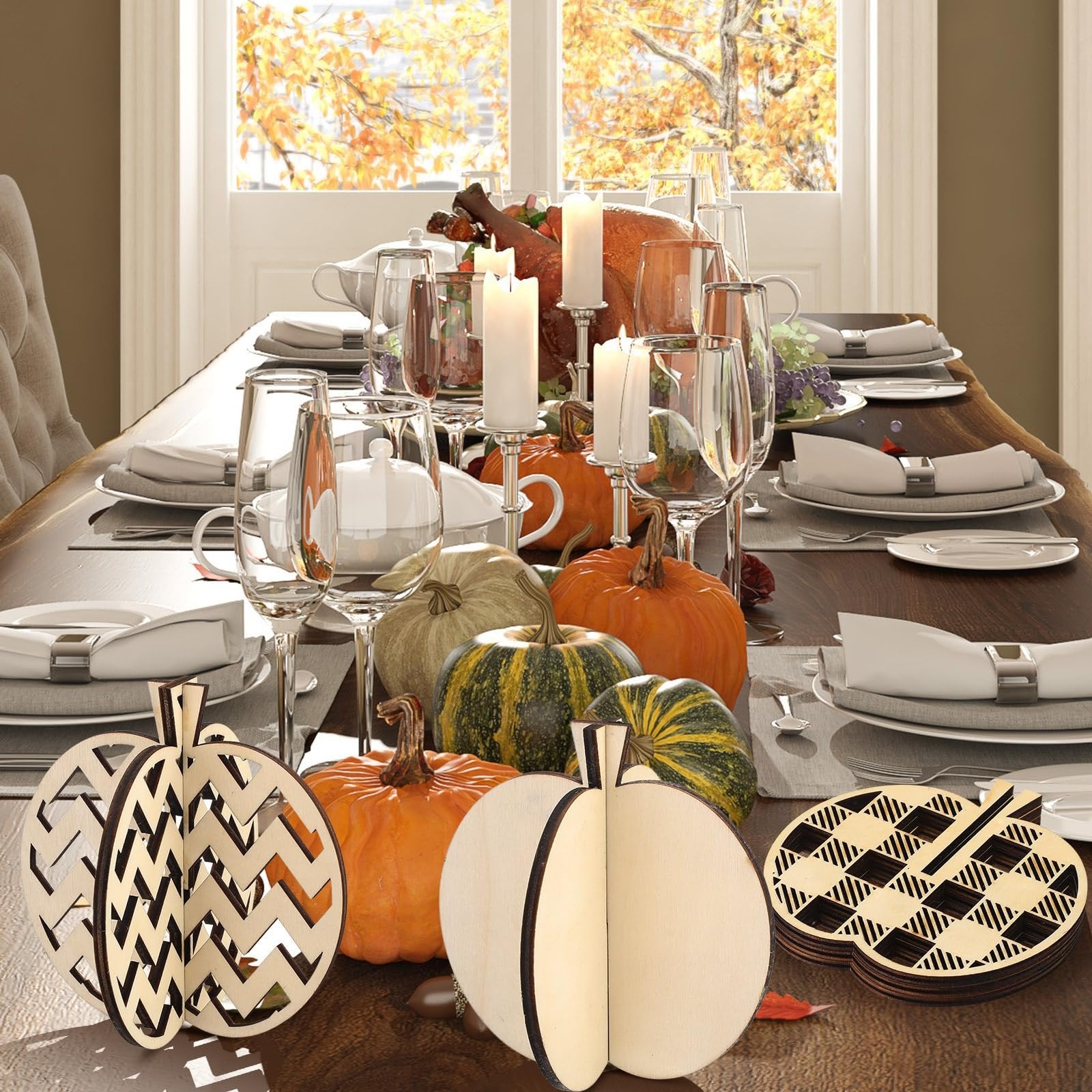 Fall craft kit with wooden pumpkin cutouts and pumpkins arranged on a Thanksgiving dinner table