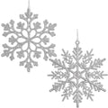 Two silver glitter snowflake Christmas ornaments hanging against a white background.