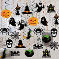 Halloween hanging swirl decorations featuring pumpkins, ghosts, witches, bats, skulls, and haunted houses.