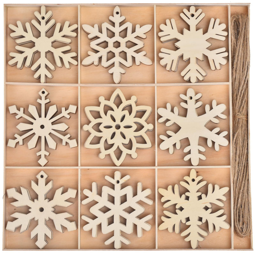 Unfinished wooden snowflake ornaments in a divided wooden box with jute rope on the side
