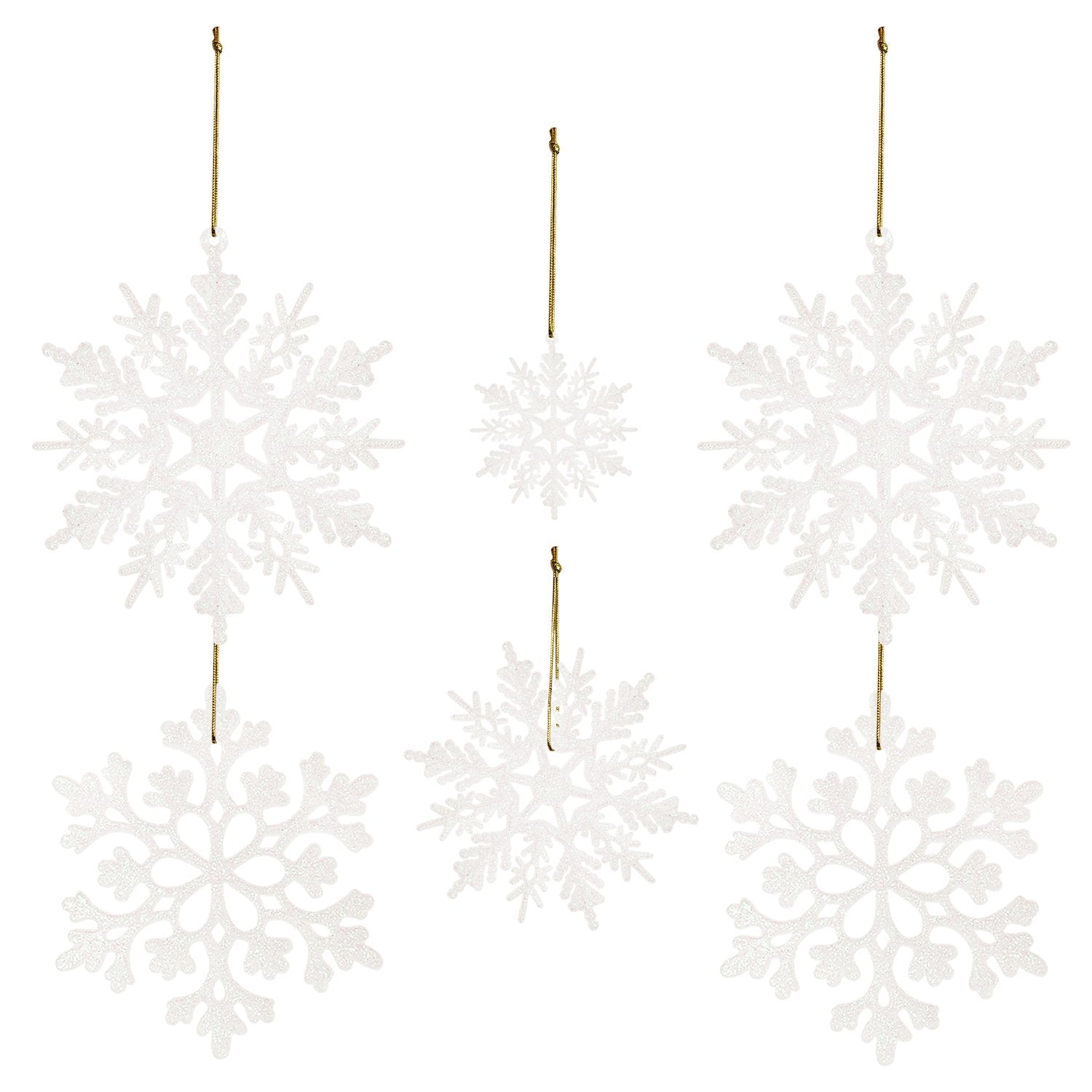 Five white glitter snowflake ornaments of varying sizes hanging by gold strings against a white background.