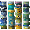 Four stacks of decorative washi tape rolls featuring famous landscape paintings and floral designs.