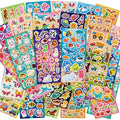 Assortment of colorful sticker sheets featuring animals, fruits, dinosaurs, and vehicles.