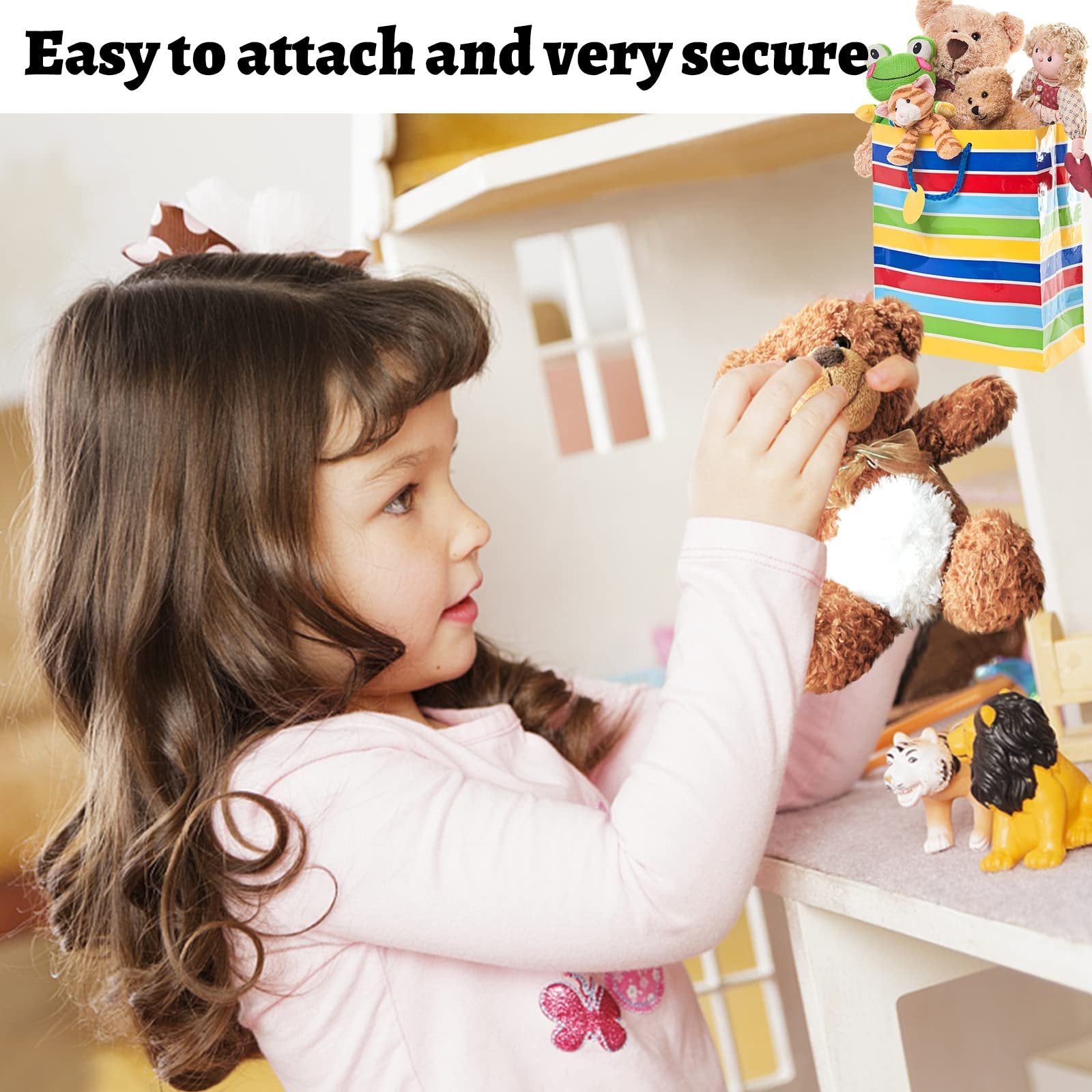 Child playing with stuffed animals near a dollhouse, with a colorful bag of toys.
