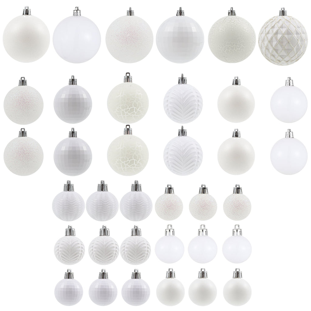 Collection of white Christmas ball ornaments in various sizes and textures, displayed on a white background.