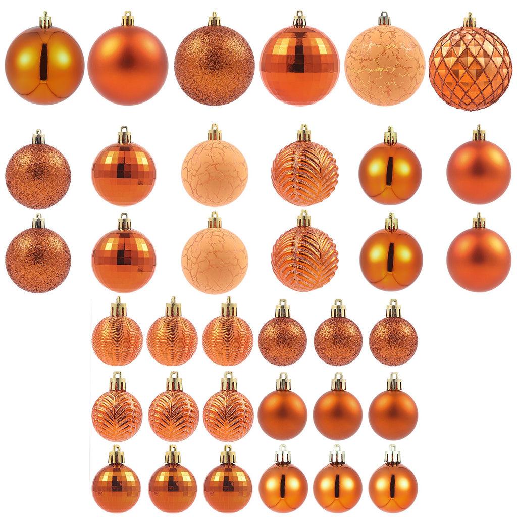 Collection of 36 copper orange Christmas ball ornaments in various sizes and styles, displayed on a white background.