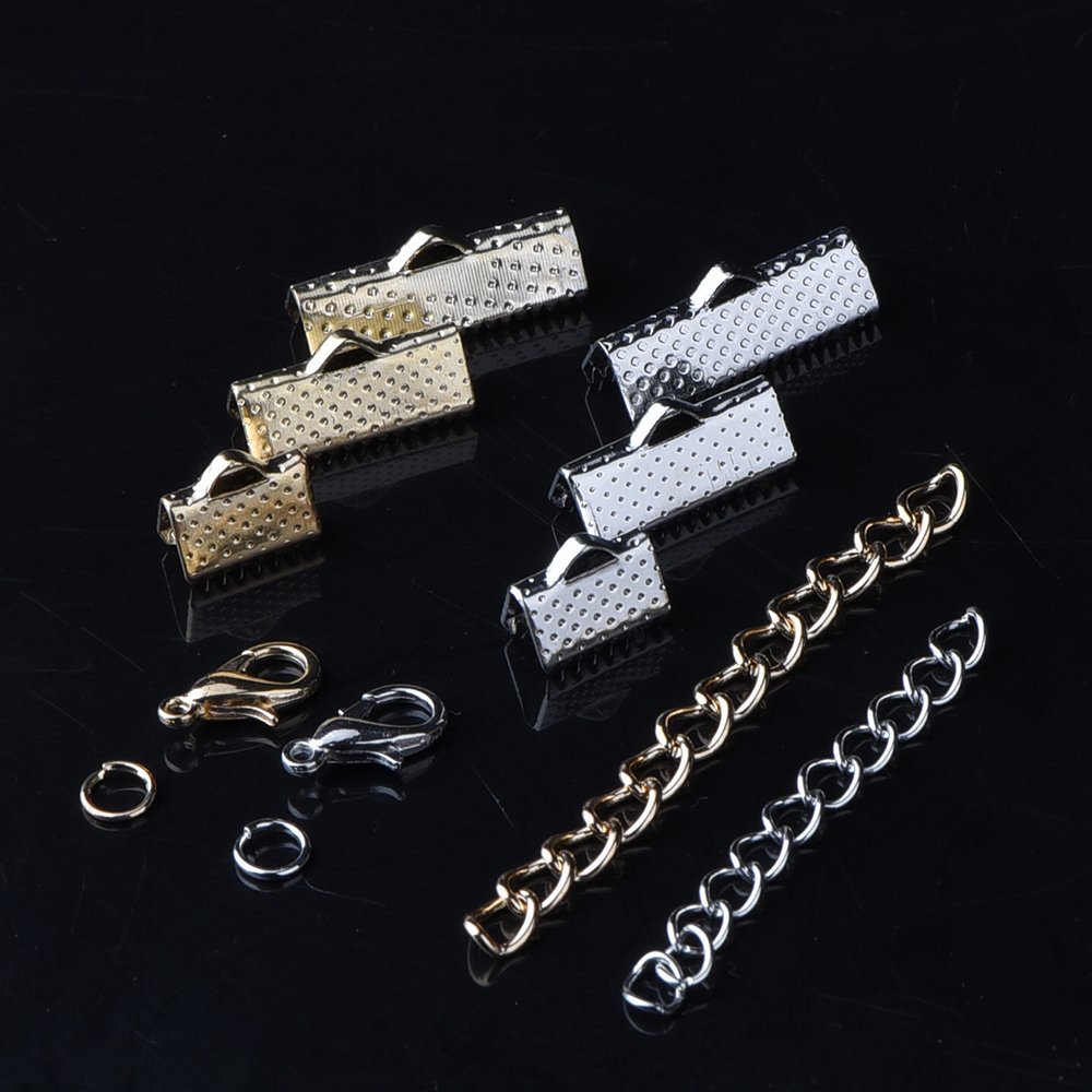 Jewelry making kit components including pinch crimp ends, lobster clasps, jump rings, and chain extenders in gold and silver tones on a black background.
