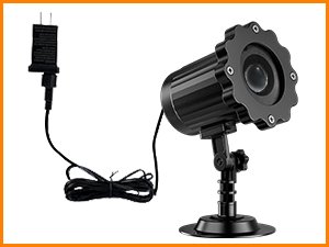 Black outdoor Halloween projector light with adjustable head and power adapter on a white background