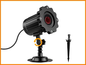 Black Halloween ghost projector light with adjustable head and ground stake, isolated on white background.
