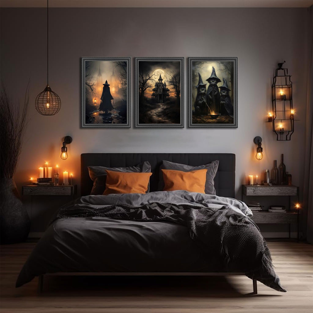 Three Halloween-themed canvas art prints depicting witches and a haunted house, displayed above a bed in a dimly lit room.