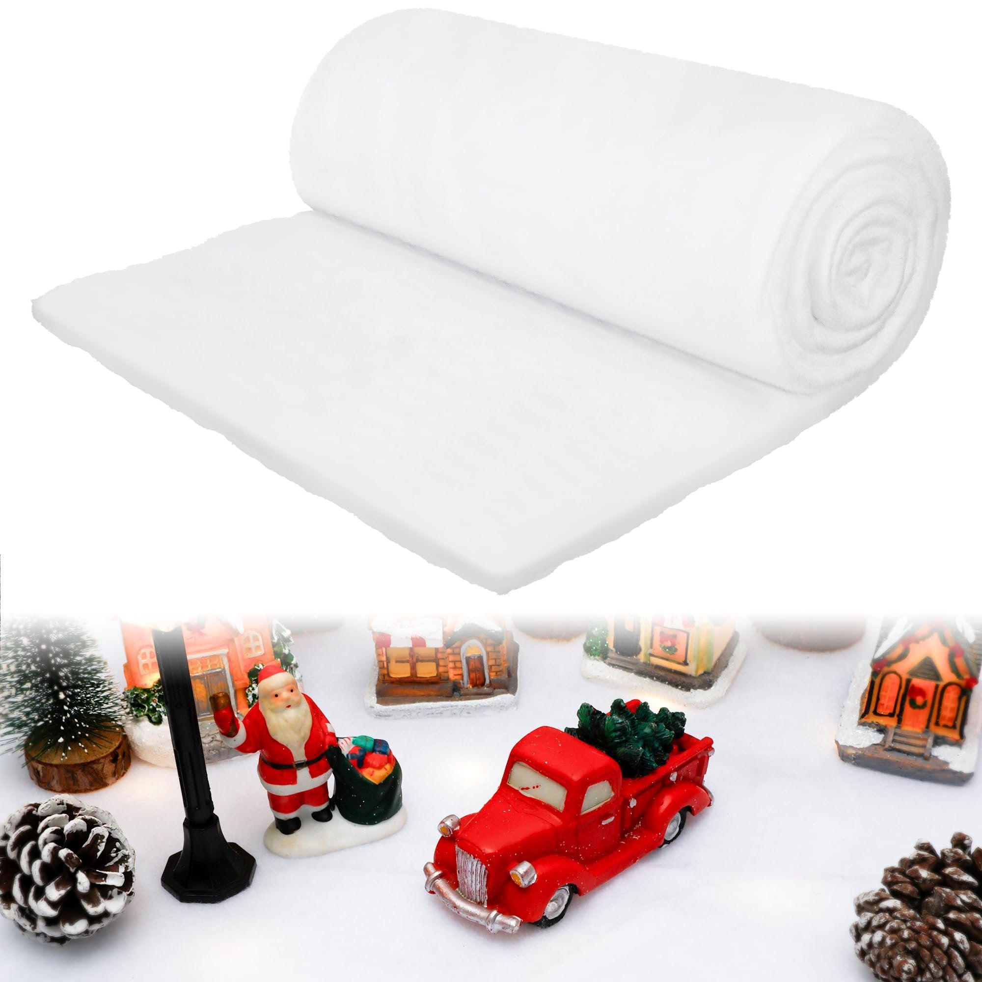 Rolled artificial snow blanket with Christmas village display including Santa, red truck, and pinecones
