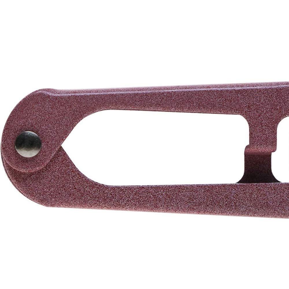 Close-up of a maroon sewing snip scissor handle on a white background.