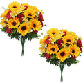 Two bouquets of artificial sunflowers, daisies, and poppies with green leaves on a white background.