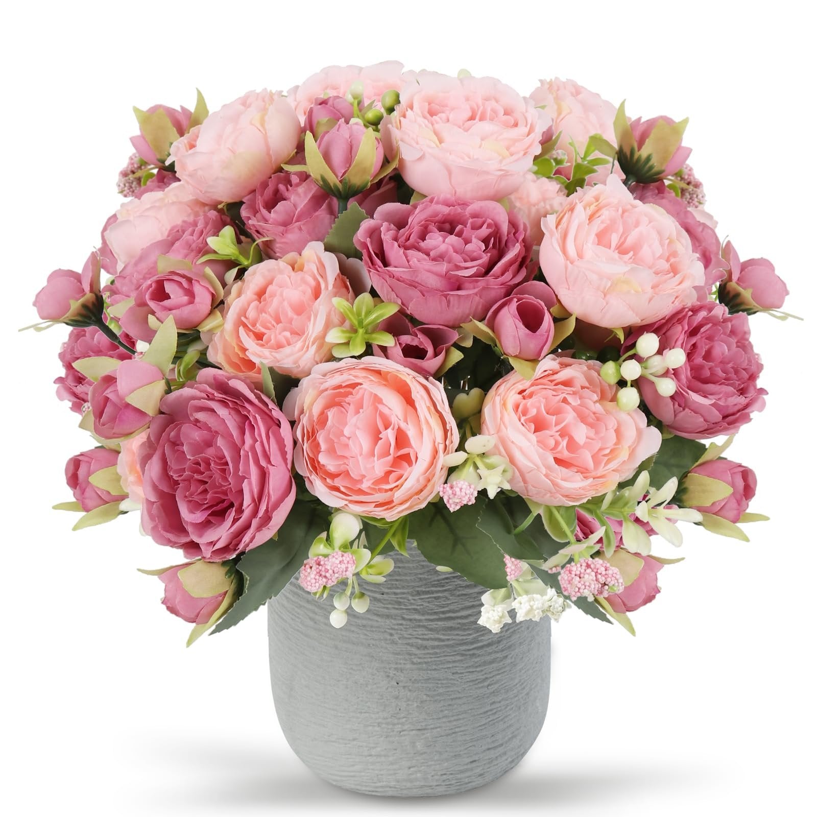 Pink and rose artificial peony bouquet with berries and green leaves in a gray textured vase, front view.