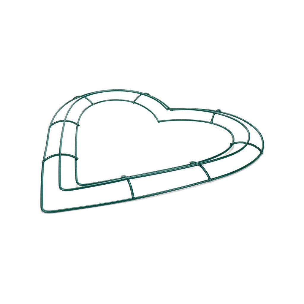 Green wire heart wreath frame on a white background, angled view