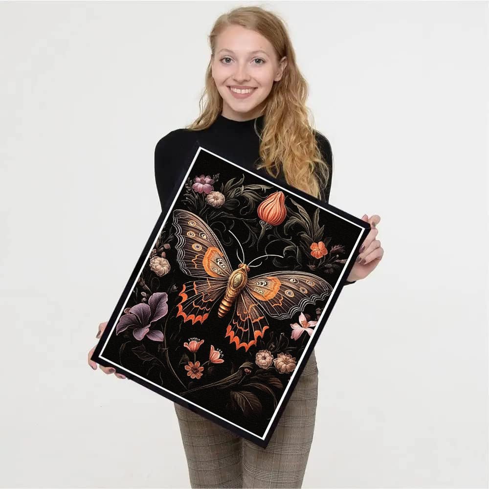 Woman holding a 5D diamond painting kit featuring a detailed butterfly and floral design on a black background.