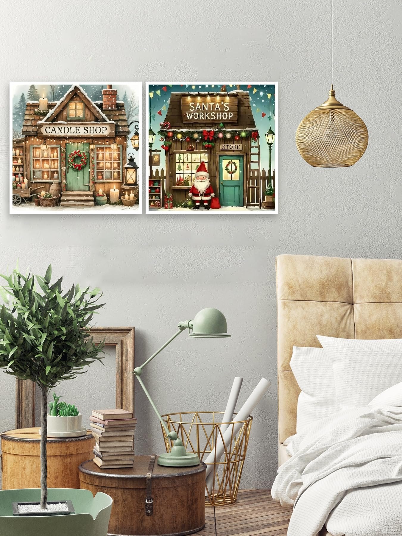 Two diamond art kits displayed on a wall, one depicting a candle shop and the other Santa's workshop.