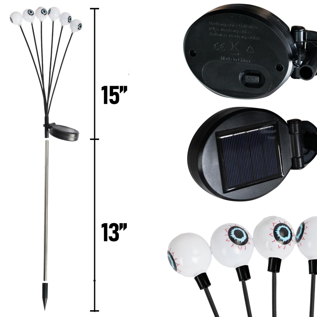 Four eyeball pathway lights with solar panels, showing dimensions 15 inches and 13 inches.