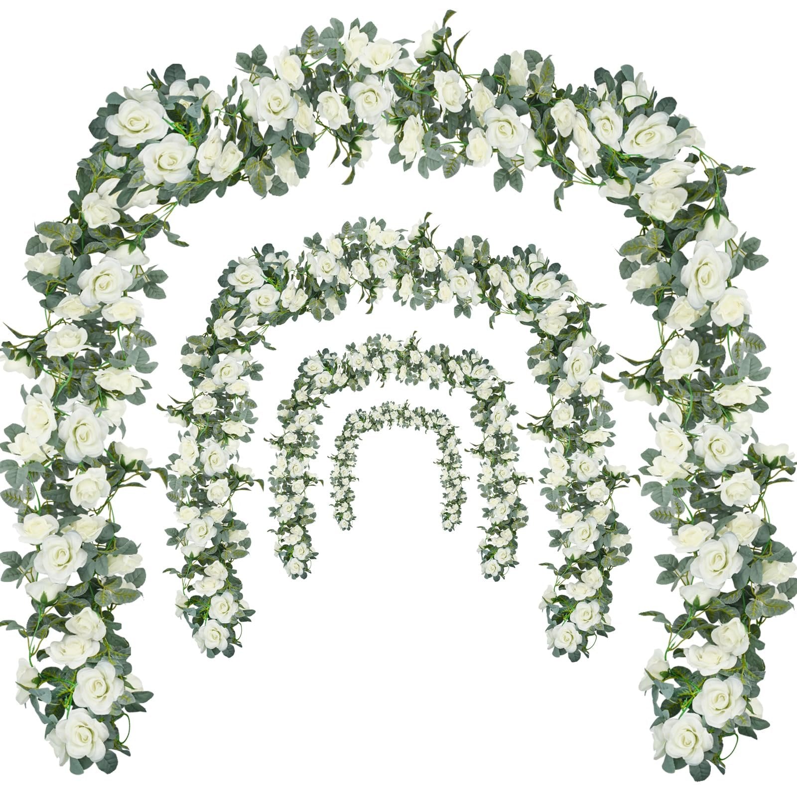 Four cascading artificial rose garlands with white flowers and green leaves arranged in arches on a white background.