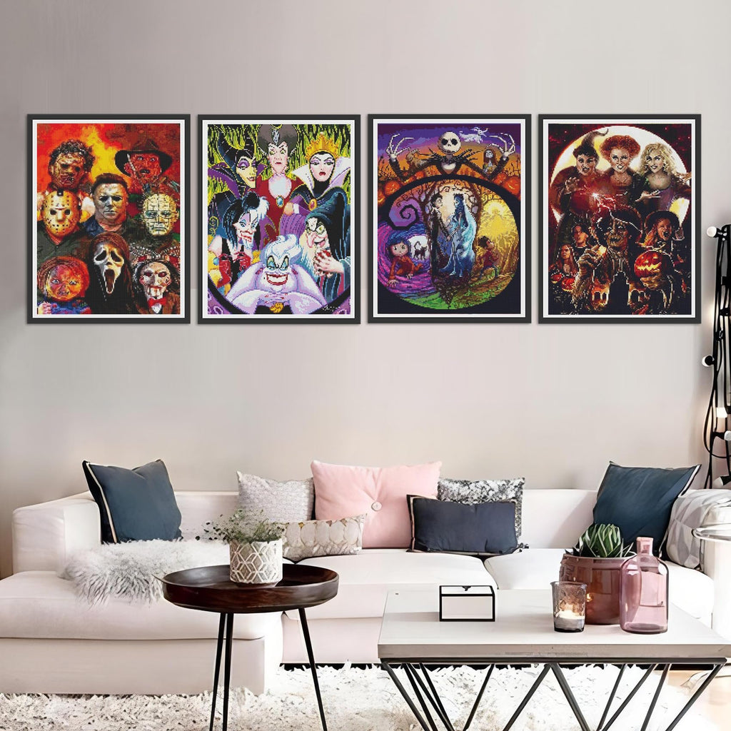 Four framed diamond art paintings of horror and Disney villains displayed on a wall above a sofa.