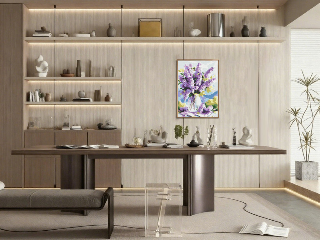 Diamond painting kit of purple flowers in a vase displayed on a wall in a modern room.