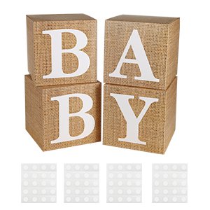Four burlap baby blocks spelling 'BABY' arranged in a 2x2 grid, with four strips of clear adhesive dots below.