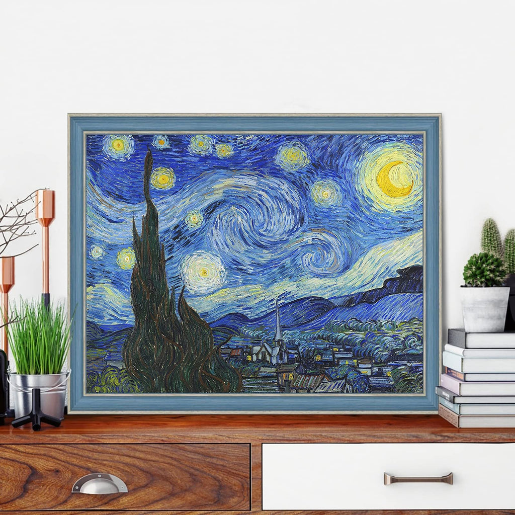 Diamond painting kit of Van Gogh's Starry Night, framed and displayed on a wooden dresser with plants and books.