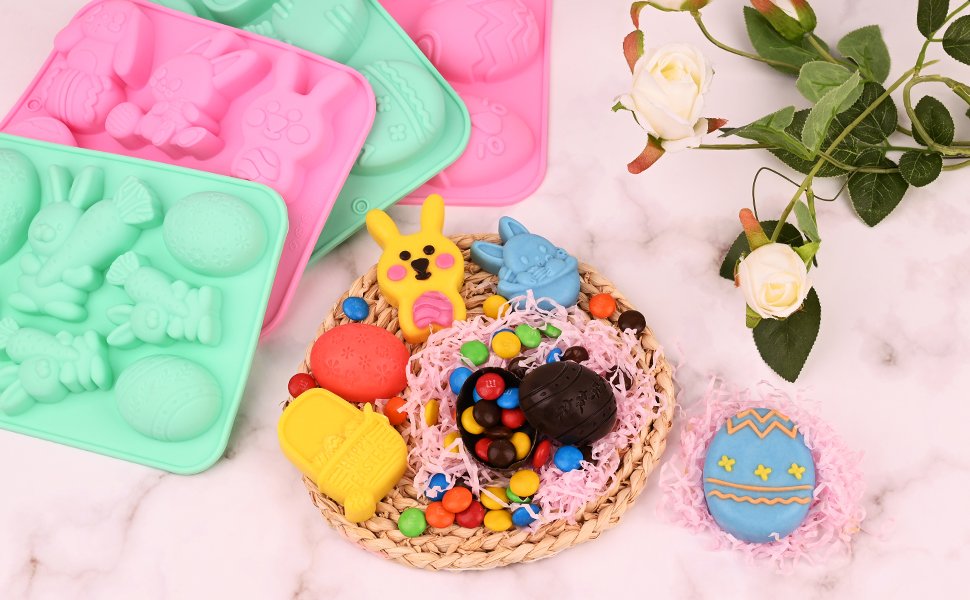 Easter silicone molds with bunny and egg shapes, some filled with candy and chocolate.