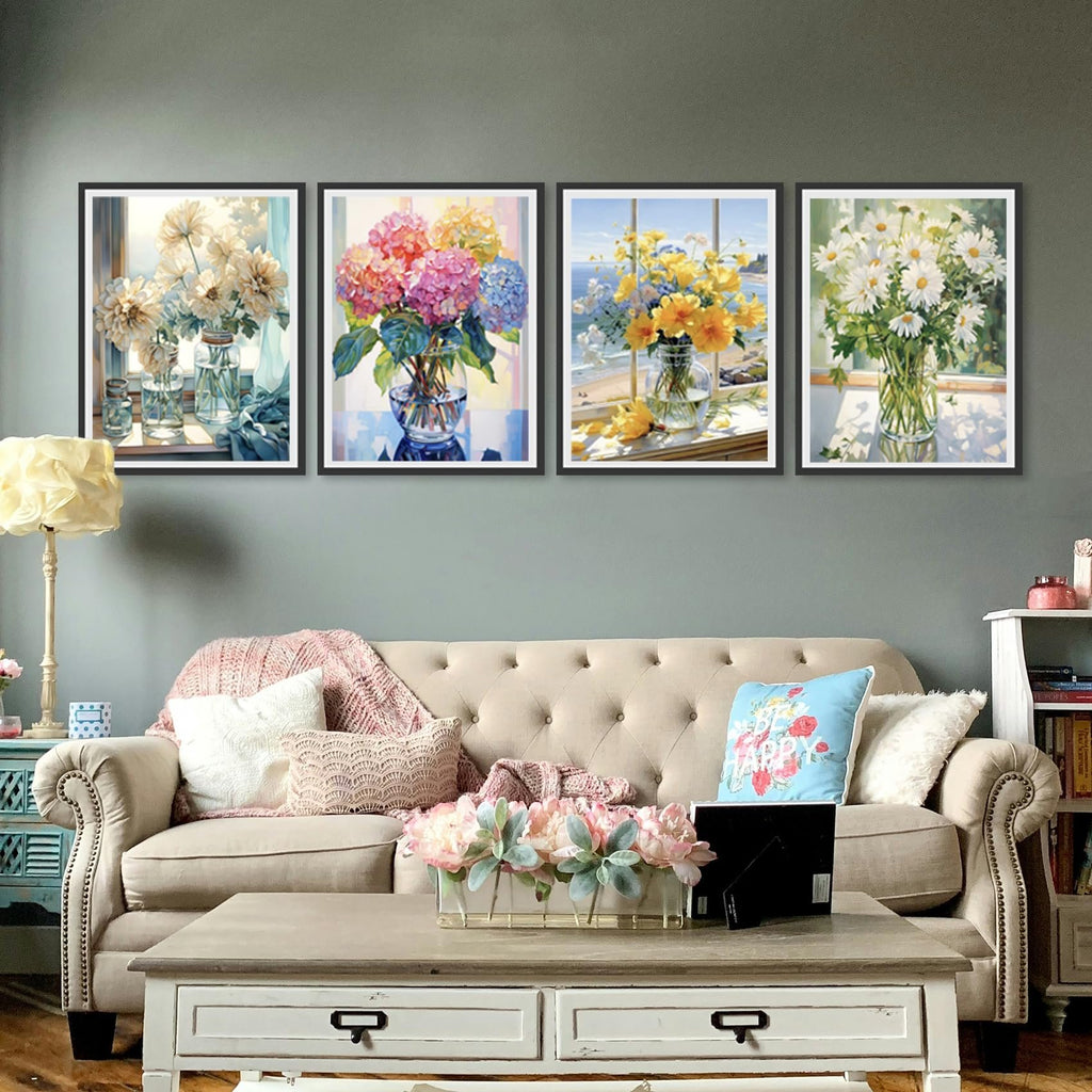 Four framed floral paint-by-number canvases displayed above a sofa, showcasing different flower arrangements in vases.