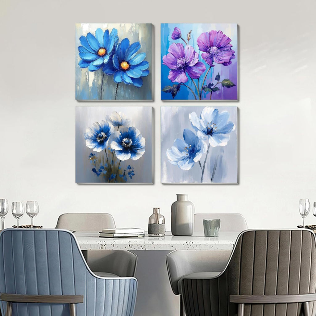 Four framed floral paintings displayed on a wall above a dining table with chairs.