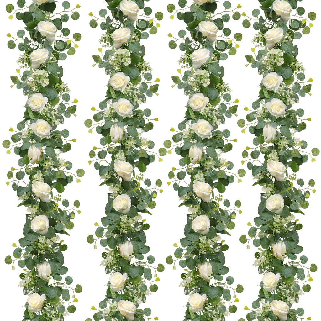 Four artificial eucalyptus and white rose garlands arranged vertically on a white background.