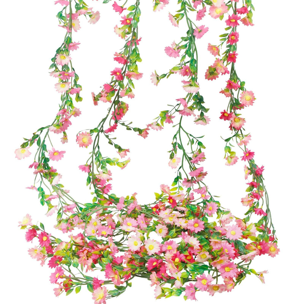 Four strands of artificial daisy flower garland with pink and rose red flowers and green leaves, displayed against a white background.