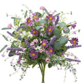 Artificial spring flower bouquet with purple daisies, lavender sprigs, and eucalyptus leaves on a white background.